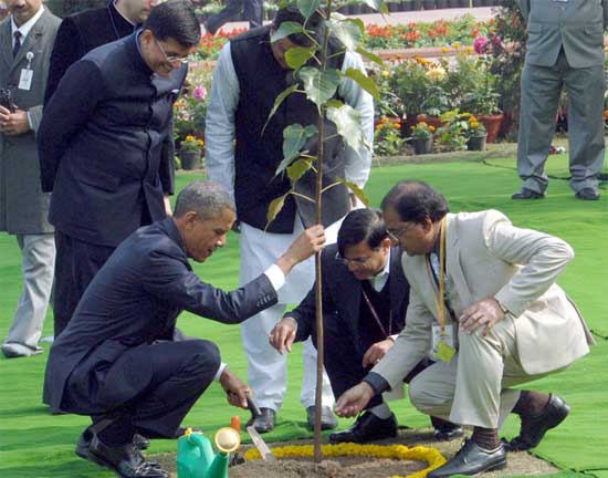 US President Barack Obama planting a sapling at Rajghat 1 US President Barack Obama planting a sapling at Rajghat
