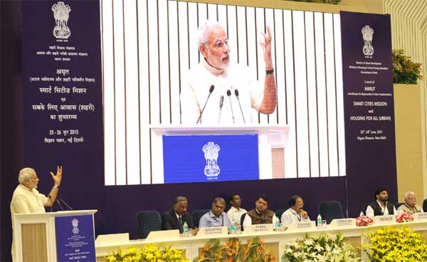 Smart cities to be decided by citizens: Modi 1 The Prime Minister, Narendra Modi addressing at the launching ceremony of the Smart Cities Mission, Atal Mission for Rejuvenation and Urban Transformation (AMRUT) and Housing for All Mission, in New Delhi on June 25, 2015. The Union Minister for Urban Development, Housing and Urban Poverty Alleviation and Parliamentary Affairs, M. Venkaiah Naidu, the Chief Minister of Haryana, Manohar Lal Khattar, the Chief Minister of Maharashtra, Devendra Fadnavis, the Minister of State for Urban Development, Housing and Urban Poverty Alleviation, Babul Supriyo, the Cabinet Secretary, Pradeep Kumar Sinha and the Secretary, Ministry of Urban Development, Madhusudhan Prasad are also seen.