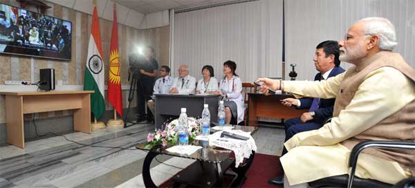 The Prime Minister, Narendra Modi inaugurating the Tele-medicine link between India and Kyrgyzstan at National Centre 1 The Prime Minister, Narendra Modi inaugurating the Tele-medicine link between India and Kyrgyzstan at National Centre for Cardiology & Internal Medicine, in Bishkek, Kyrgyzstan on July 12, 2015. The Prime Minister of Kyrgyz Republic, Temir Sariyev is also seen.