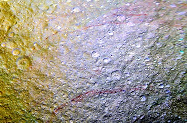 NASA probe spots unusual red arcs on icy Saturn moon 1 30nasa