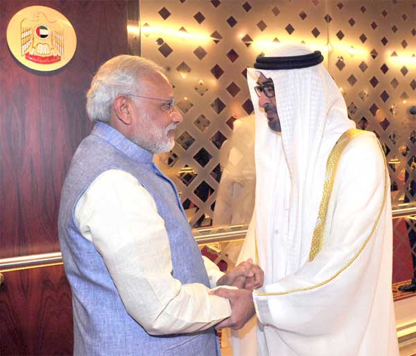 The Prime Minister, Narendra Modi being received by the Crown Prince of Abu Dhabi, His Highness Sheikh Mohammed bin Zayed Al Nahyan, 1 The Prime Minister, Narendra Modi being received by the Crown Prince of Abu Dhabi, His Highness Sheikh Mohammed bin Zayed Al Nahyan, on his arrival at Abu Dhabi Airport on August 16, 2015.