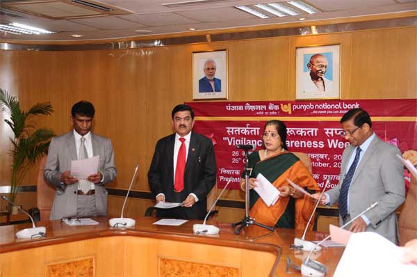 पीएनबी द्वारा सतर्कता जागरूकता सप्ताह-2015 का आयोजन 1 उषा अनंतसुब्रह्मण्यसन, प्रबंध निदेशक एवं सीईओ द्वारा पीएनबी प्रधान कार्यालय में शपथ दिलाई गई। इस अवसर पर श्री गौरी शंकर, श्री के वी ब्रह्माजी राव, डा0 आर एस संगापूरे, कार्यपालक निदेशकगण उपस्थित हैं।