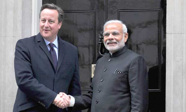 Prime Minister, Narendra Modi and the Prime Minister of United Kingdom (UK), David Cameroon 1 The Prime Minister, Narendra Modi and the Prime Minister of United Kingdom (UK), David Cameroon, at the Drum (Treasury Quadrangle), in London on November 12, 2015.