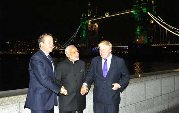 Prime Minister, Narendra Modi, the Prime Minister of United Kingdom (UK), David Cameroon and the Mayor of London 1 The Prime Minister, Shri Narendra Modi, the Prime Minister of United Kingdom (UK), David Cameroon and the Mayor of London, Boris Johnson along the River Thames with a view of the London Eye, London on November 12, 2015.