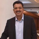 Romon Sebastian Louis has taken over as Director [Service Businesses]