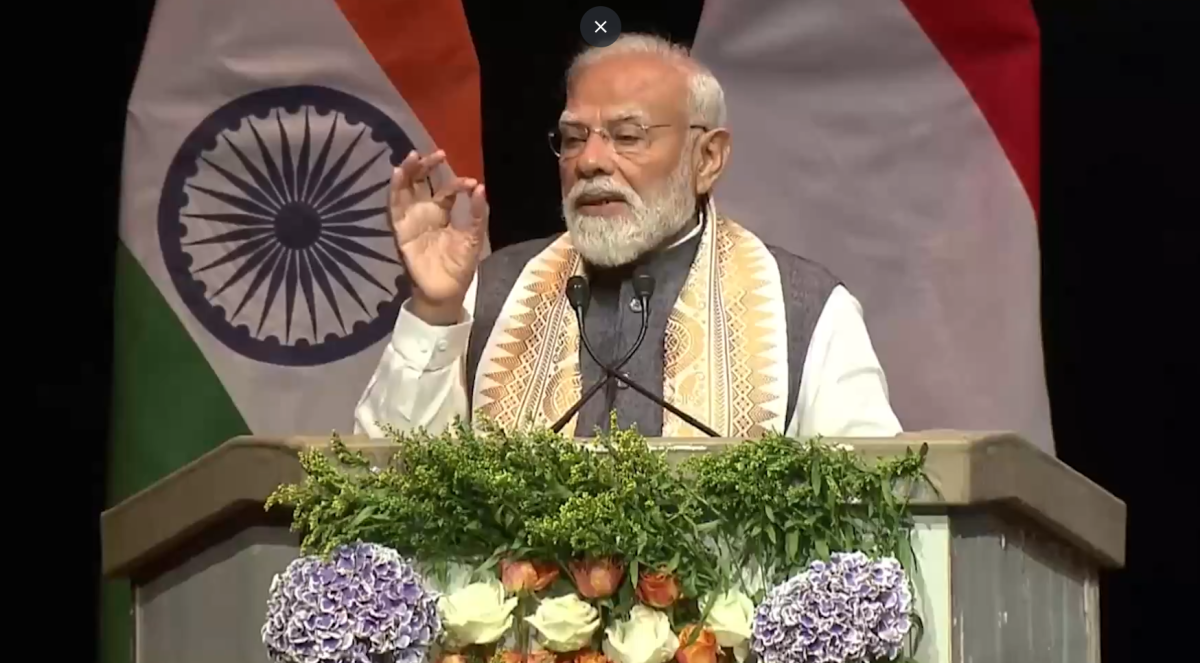 feature news 231 Prime Minister Narendra Modi releasing PM-KISAN instalment funds for farmers during a programme in West Bengal