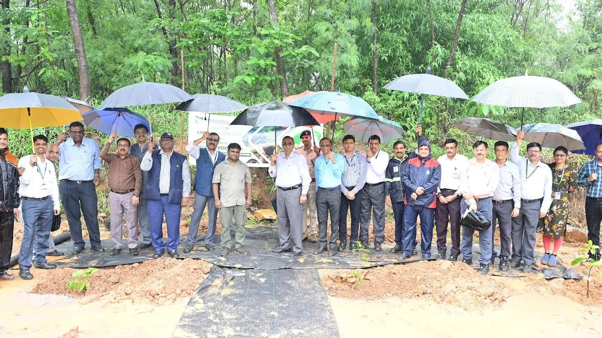 feature news 358 MRPL officials and Karnataka Forest Department officers participating in tree plantation drive